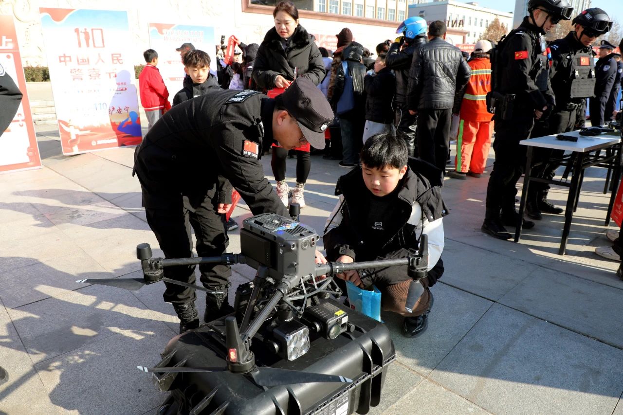 中国人民警察节丨周口市公安局开展庆祝第五个中国人民警察节暨“110宣传日”集中宣传活动-图片5